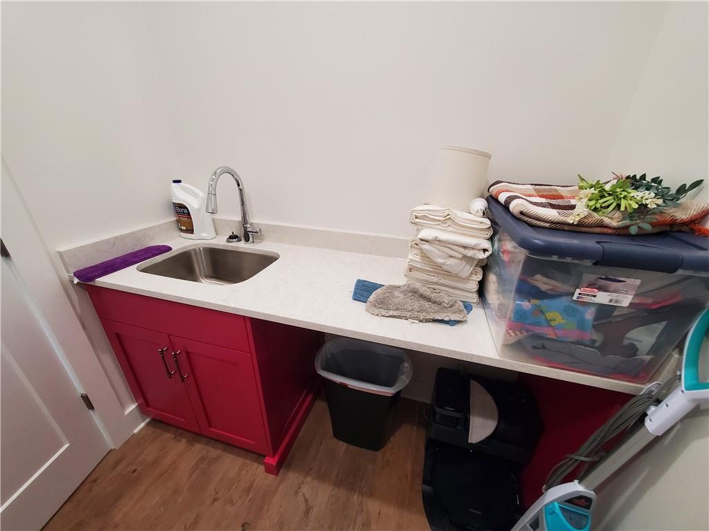 876 Cline Road Resaca, GA 30735 - Photo 19 of 78 a kitchen with a sink a table and a stove