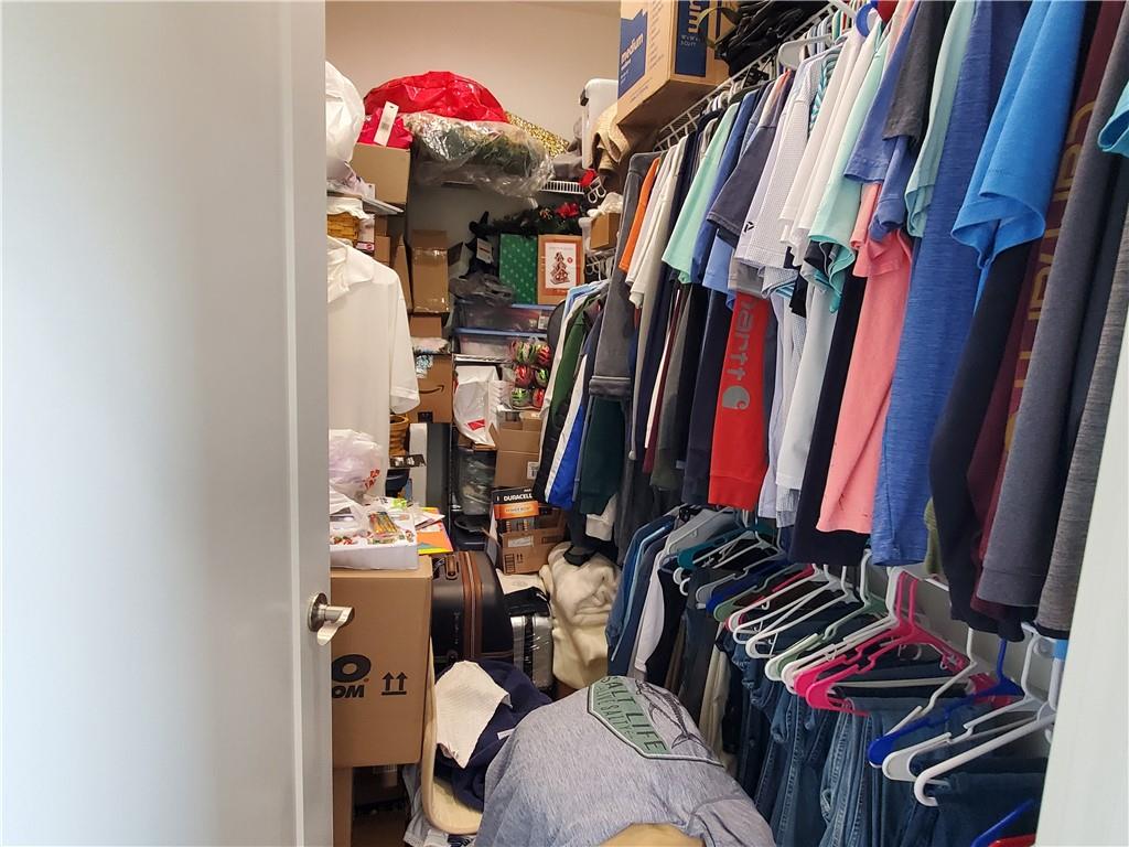 876 Cline Road Resaca, GA 30735 - Photo 23 of 78 a view of walk in closet with clothes and shoes