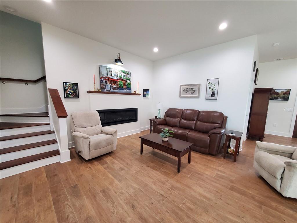 876 Cline Road Resaca, GA 30735 - Photo 3 of 78 a living room with furniture and a fireplace