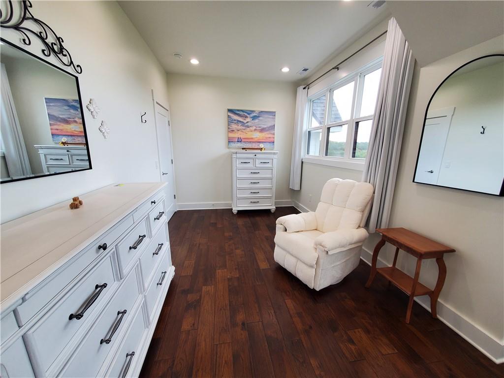 876 Cline Road Resaca, GA 30735 - Photo 31 of 78 a spacious bedroom with a bed and a couch