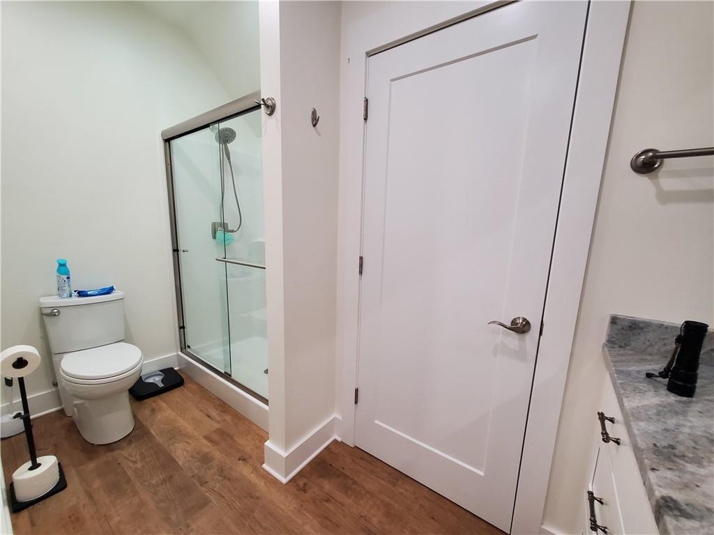 876 Cline Road Resaca, GA 30735 - Photo 33 of 78 a bathroom with a toilet and a shower