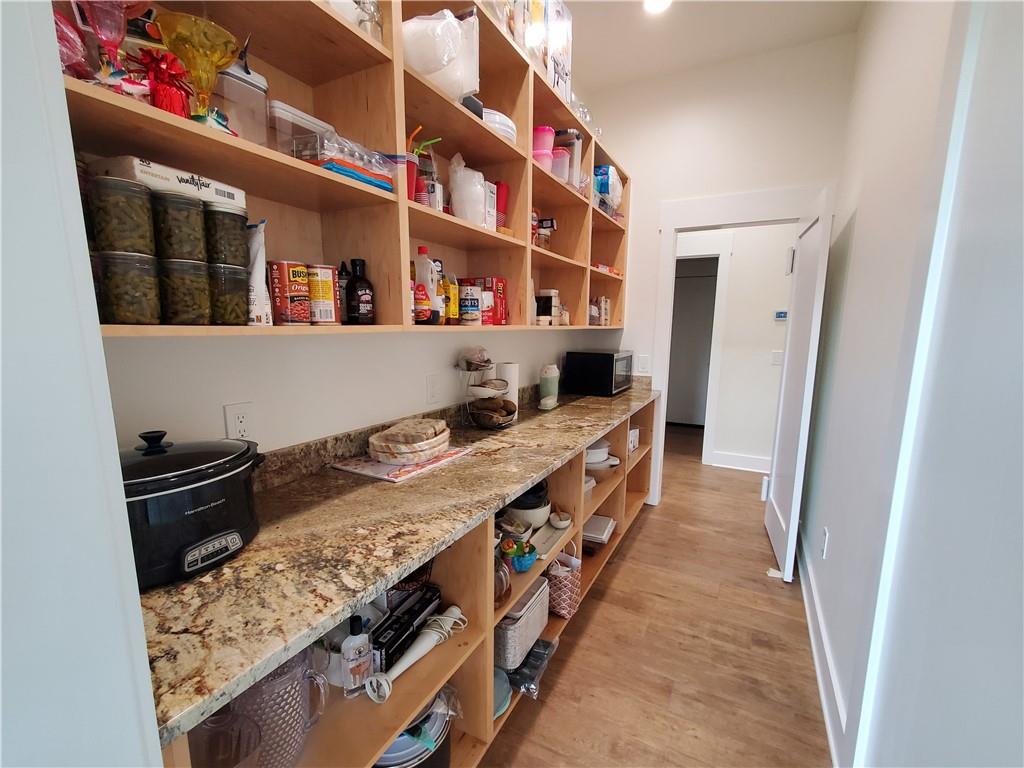 876 Cline Road Resaca, GA 30735 - Photo 9 of 78 a kitchen with stainless steel appliances granite countertop a stove and a refrigerator