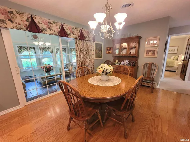 a room with gym equipment and a large window