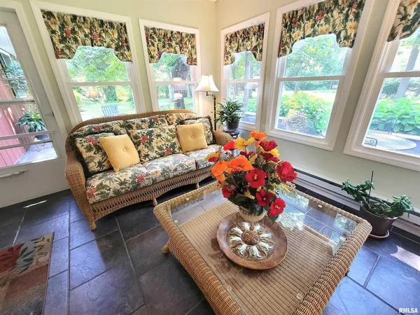 a view of a room with a large window