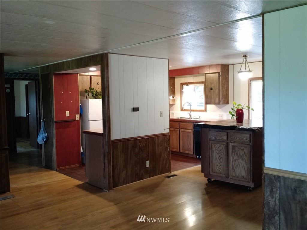 150 Nix Road Chehalis, WA 98532 - Photo 12 of 13 a kitchen with granite countertop a sink and cabinets