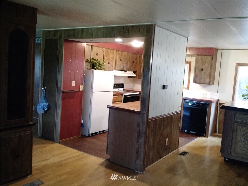 150 Nix Road Chehalis, WA 98532 - Photo 13 of 13 a kitchen with stainless steel appliances granite countertop a refrigerator and a sink