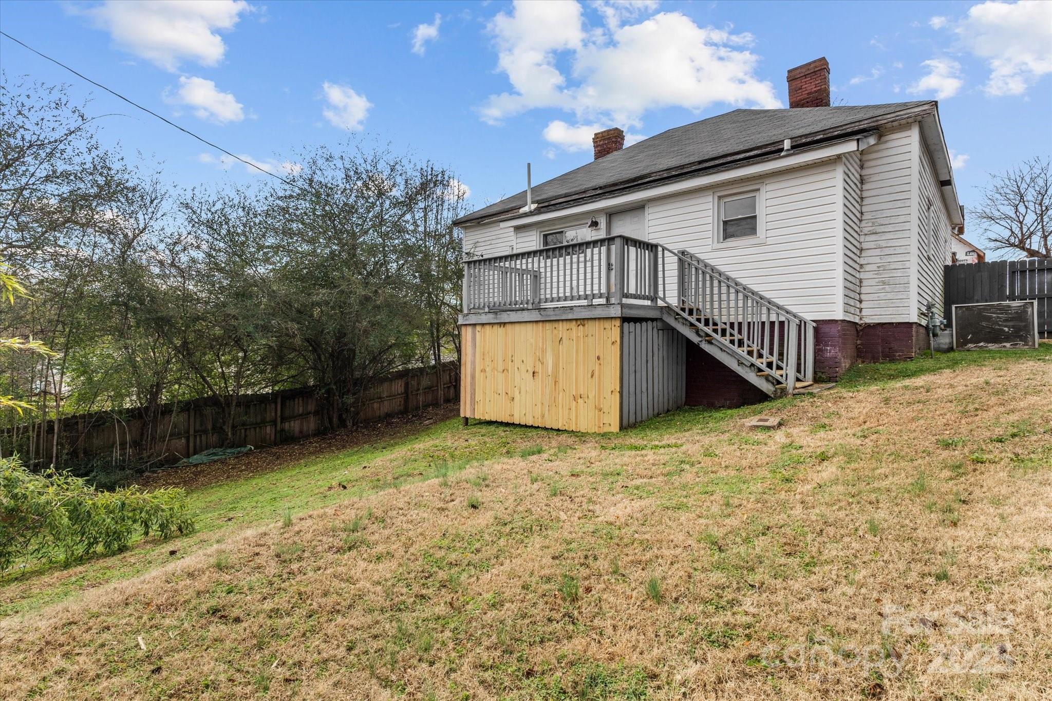 30 2nd Street Cramerton, NC 28032 - Photo 20 of 21 a house with trees in the background