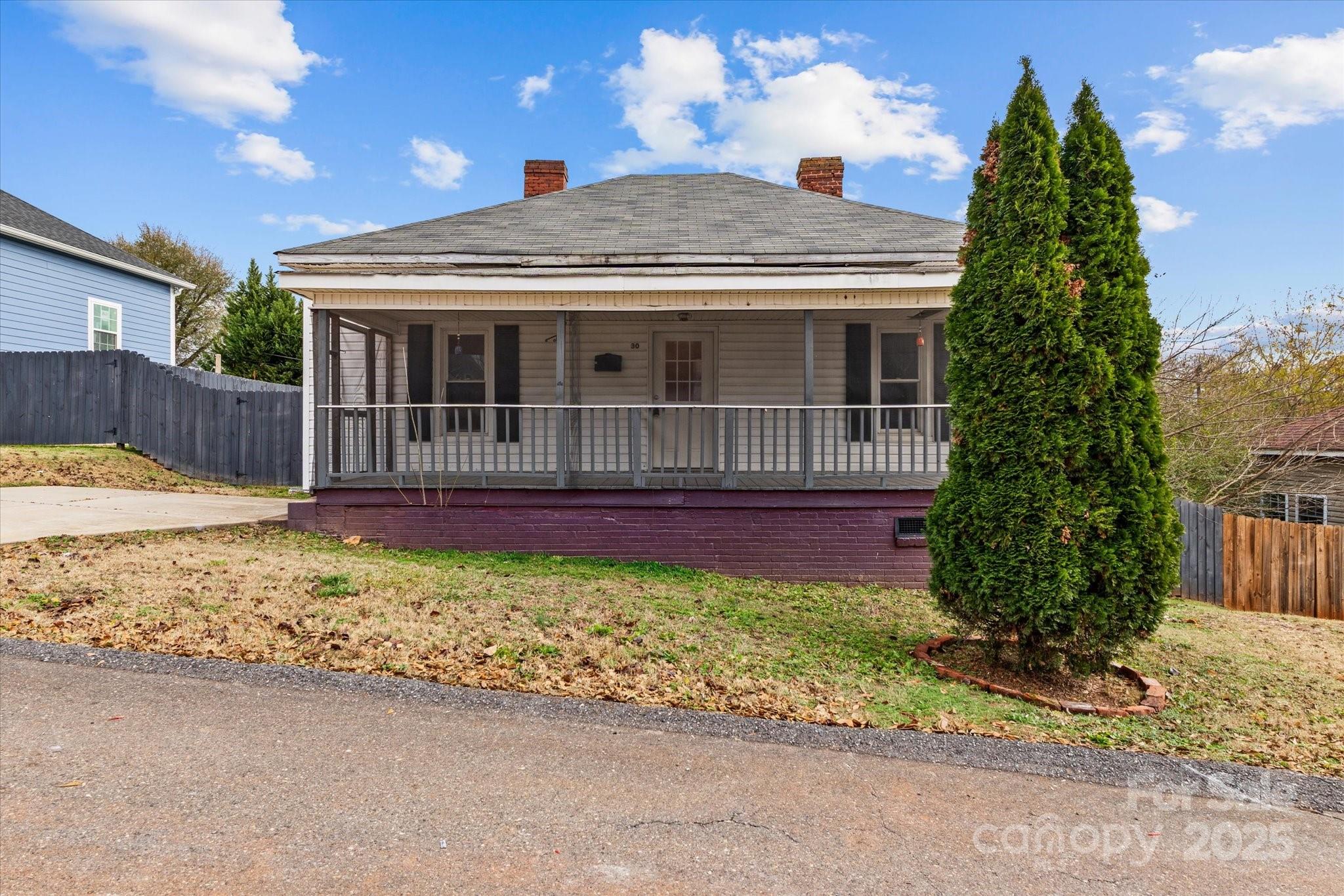 30 2nd Street Cramerton, NC 28032 - Photo 3 of 21 a view of a house with a yard