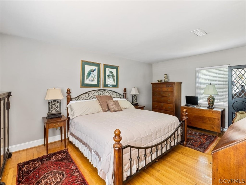4610 Butte Road Richmond, VA 23235 - Photo 17 of 48 a bedroom with bed and a window