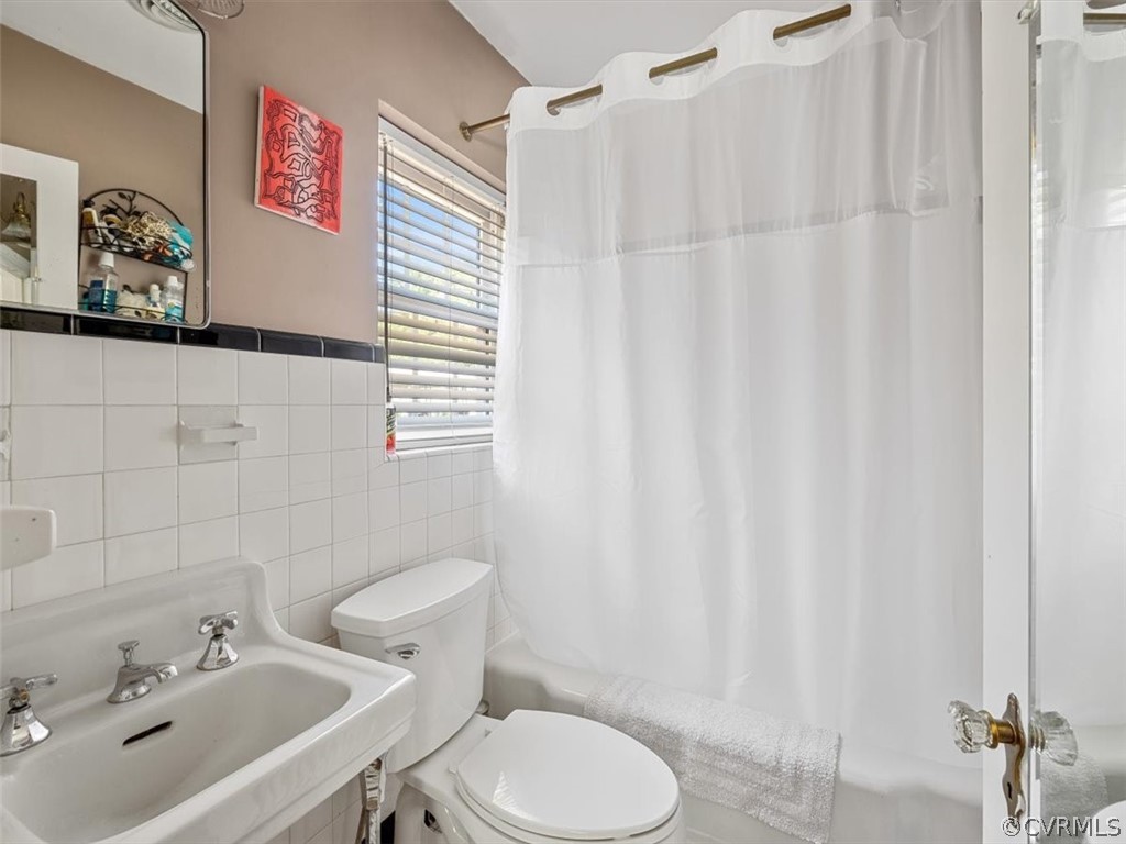 4610 Butte Road Richmond, VA 23235 - Photo 23 of 48 a bathroom with a sink and a toilet