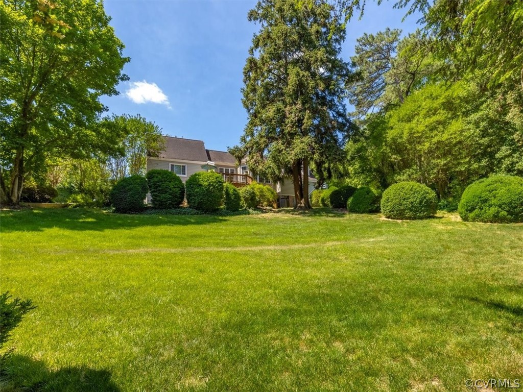 4610 Butte Road Richmond, VA 23235 - Photo 41 of 48 a view of a field with grass and trees