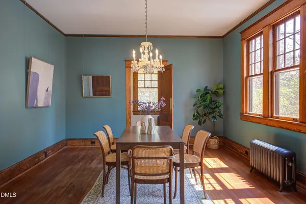 a view of a dining room with furniture window and outside view