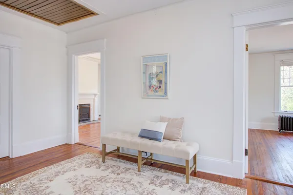a view of a livingroom with furniture and wooden floor