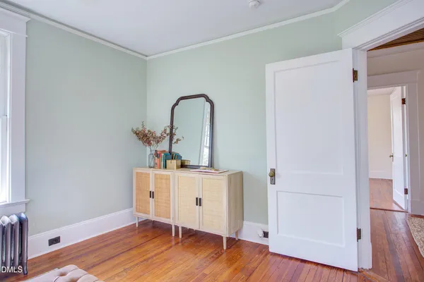 a view of a room that has a bench in it