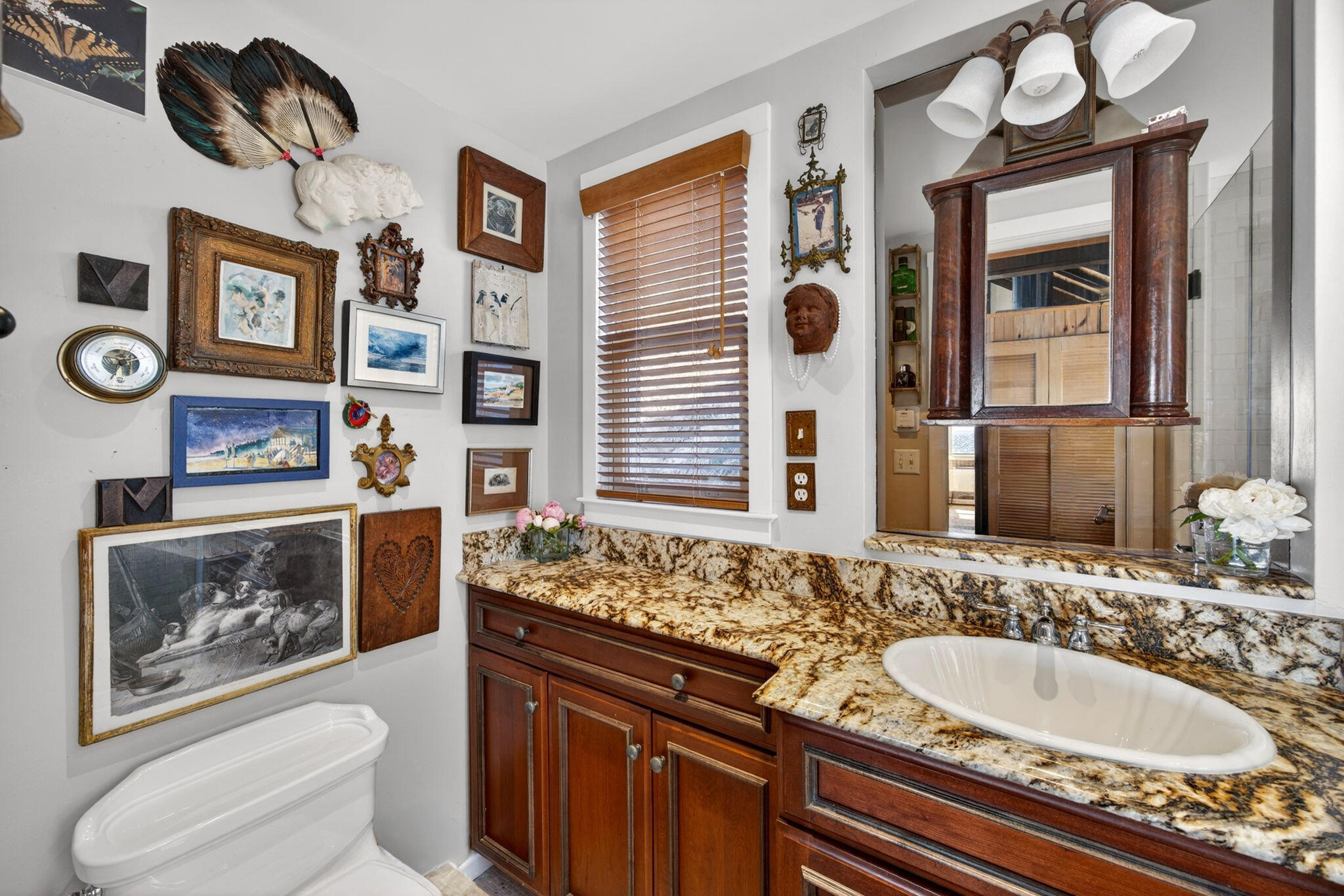 47 Pond Road Truro, MA 02666 - Photo 31 of 55 a bathroom with a granite countertop sink and a mirror