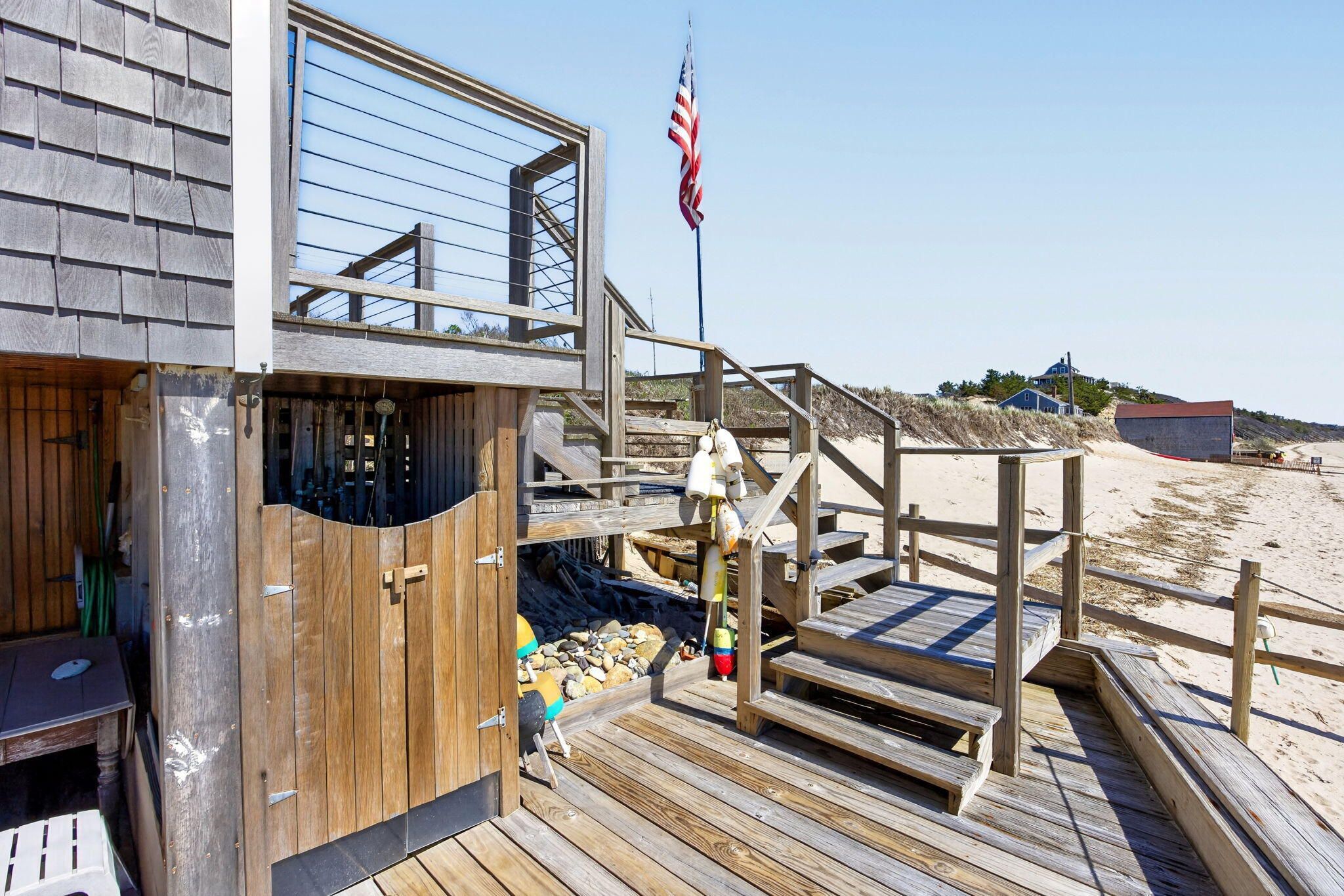 47 Pond Road Truro, MA 02666 - Photo 50 of 55 a view of balcony with furniture and wooden floor