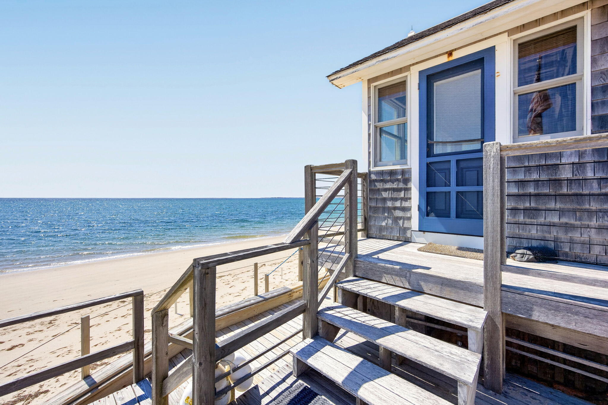 47 Pond Road Truro, MA 02666 - Photo 51 of 55 a view of balcony with couch and wooden floor