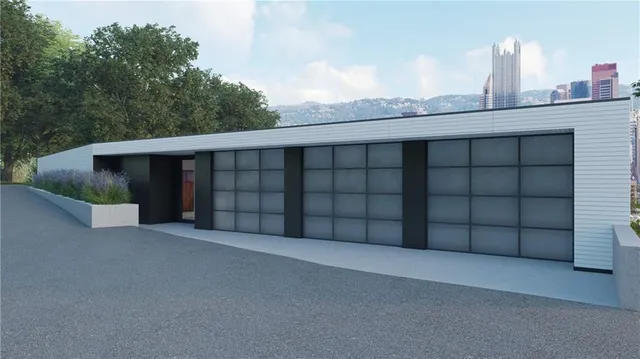 a view of a house with a garage