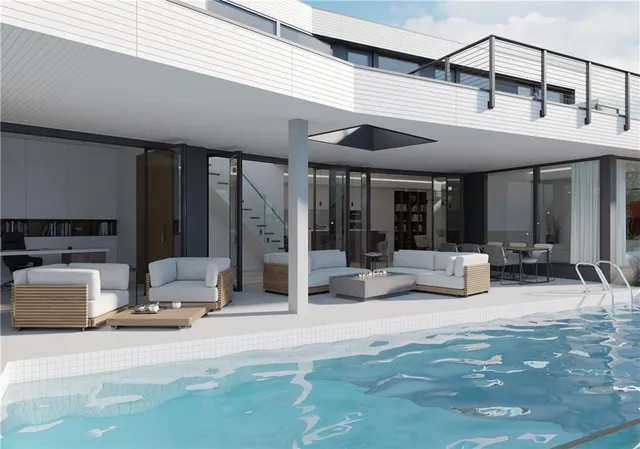 a view of the patio with dining table and chairs with wooden floor