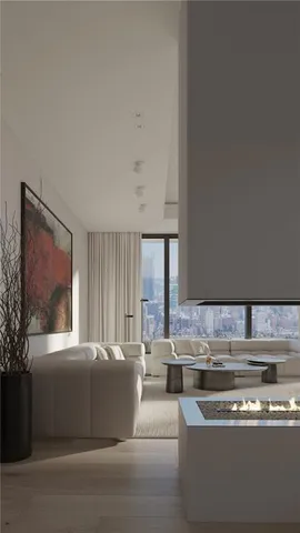 a living room with stainless steel appliances kitchen island granite countertop a sink stove and cabinets