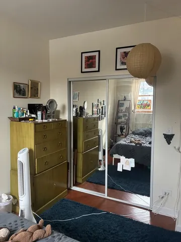 a room with furniture and a window