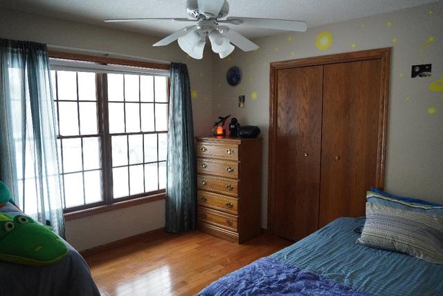 265 Grandin Road Morris, IL 60450 - Photo 14 of 29 wooden floor in an empty room with a window