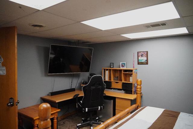 265 Grandin Road Morris, IL 60450 - Photo 21 of 29 a room with furniture wall paintings and a window