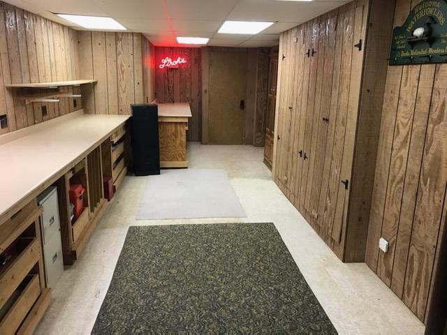 265 Grandin Road Morris, IL 60450 - Photo 25 of 29 a kitchen with a wooden floor and cabinets
