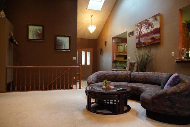 265 Grandin Road Morris, IL 60450 - Photo 4 of 29 a living room with furniture and wooden floor