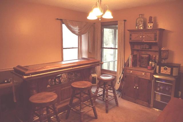 265 Grandin Road Morris, IL 60450 - Photo 9 of 29 a view of a dining room with furniture and a chandelier
