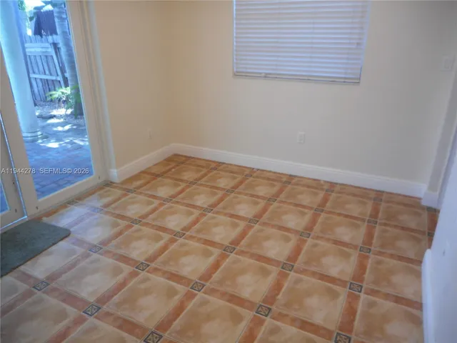 a bathroom with a toilet sink and shower