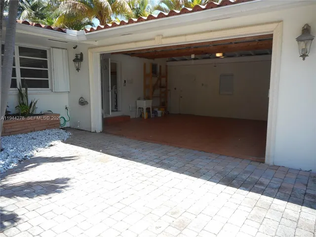 a view of backyard and porch
