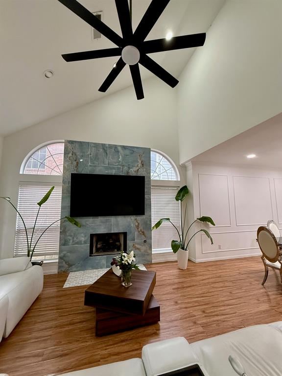 417 Moonlight Way Irving, TX 75063 - Photo 2 of 31 a living room with furniture and a fireplace