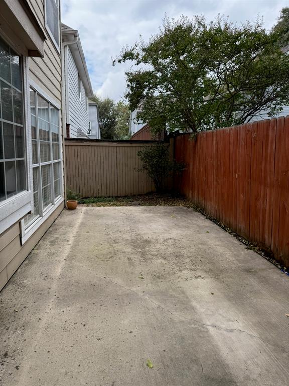 417 Moonlight Way Irving, TX 75063 - Photo 30 of 31 a view of backyard with wooden fence