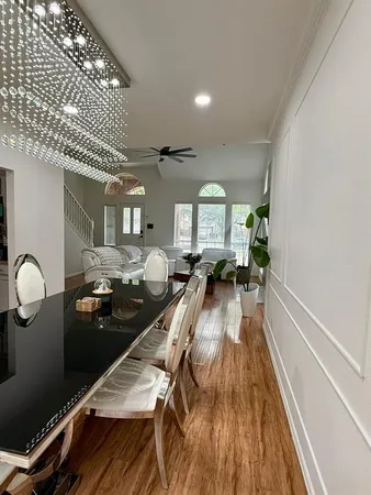 a view of a living room and dining room