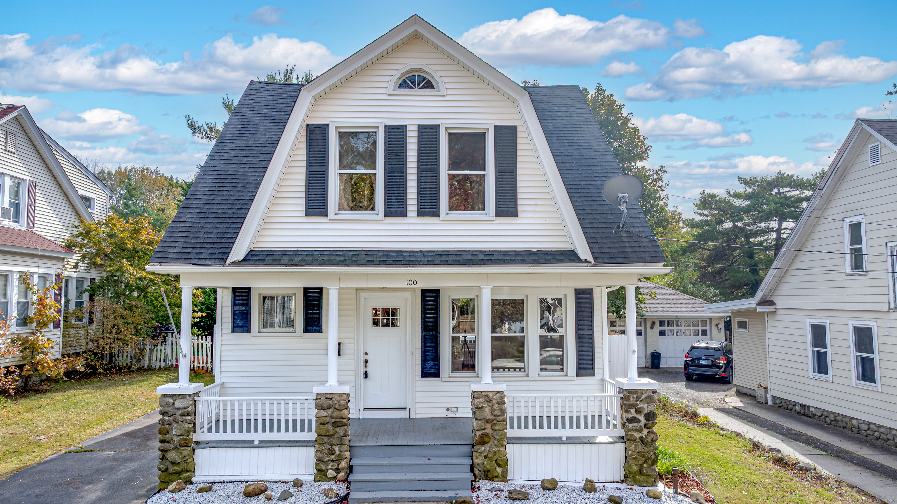 100 Ridgefield Avenue Waterbury, CT 06705 - Photo 1 of 35 a front view of a house with garden