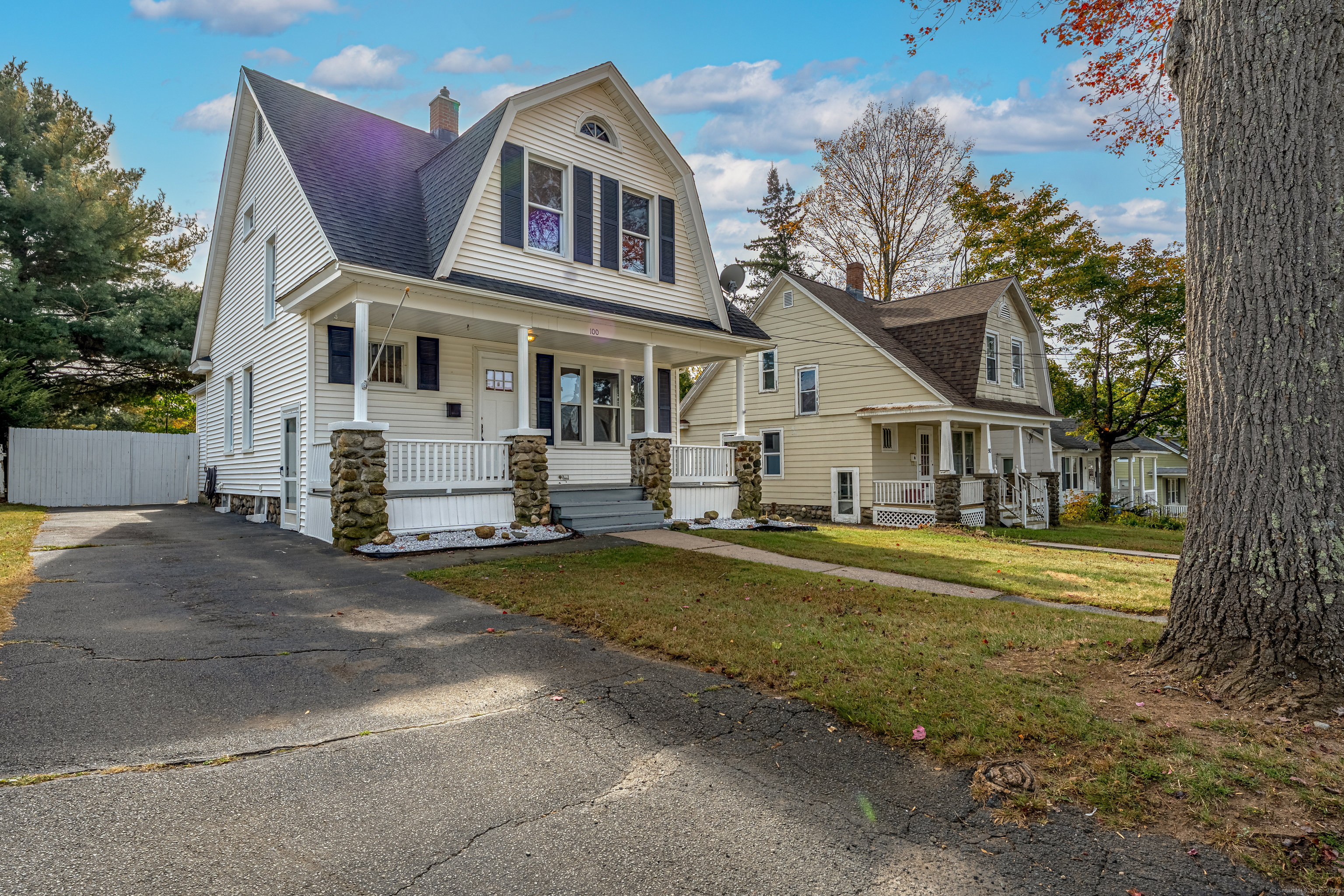 100 Ridgefield Avenue Waterbury, CT 06705 - Photo 34 of 35 a front view of a house with a garden