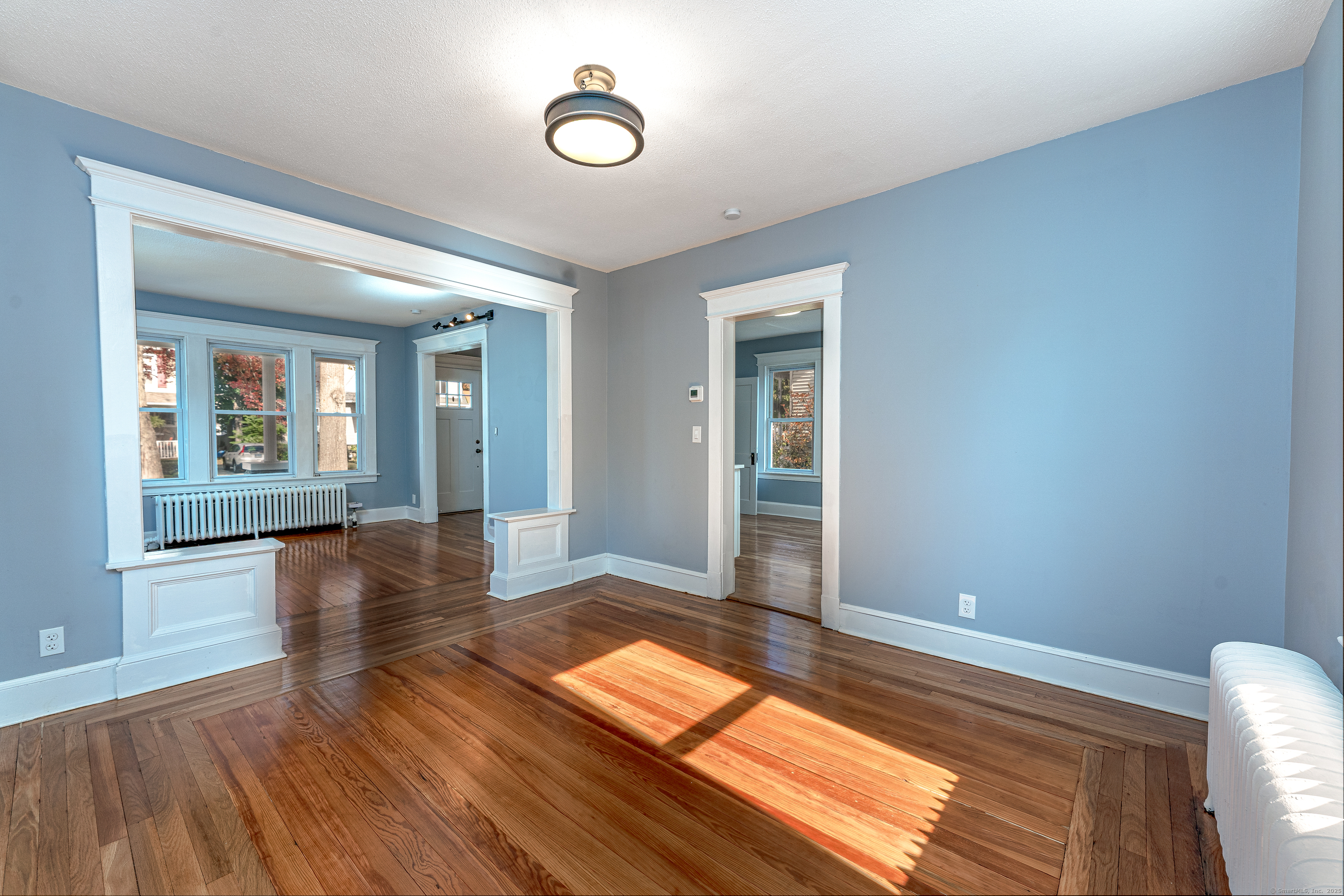 100 Ridgefield Avenue Waterbury, CT 06705 - Photo 9 of 35 wooden floor in a hall with an entryway