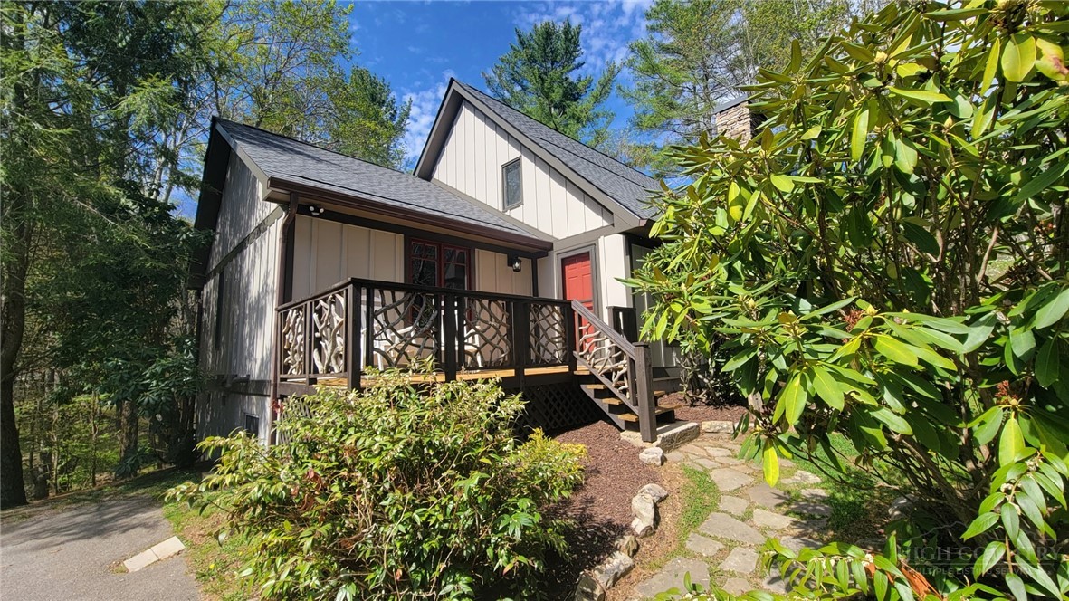 172 Yarrow Lane Boone, NC 28607 - Photo 2 of 30 a view of a house with a small yard and plants