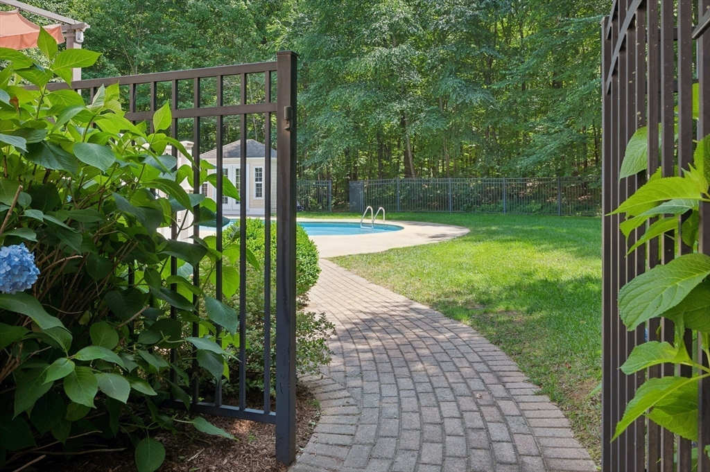 10 Burnett Road Southborough, MA 01772 - Photo 36 of 42 a backyard of a house with lots of green space