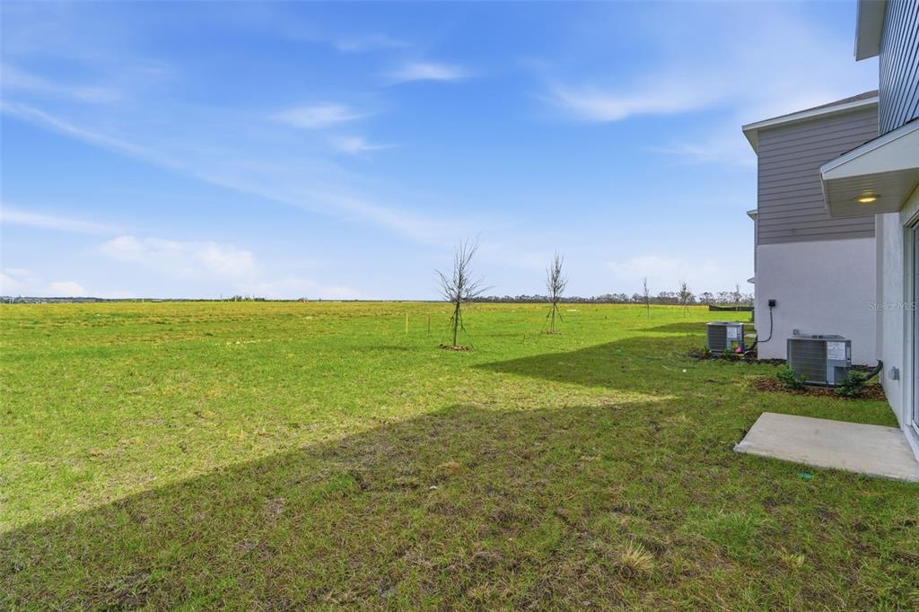 2756 Lookout Rdg Road Haines City, FL 33844 - Photo 13 of 53 a view of outdoor space with deck and yard