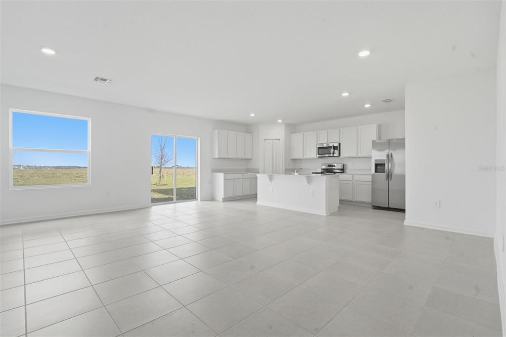 2756 Lookout Rdg Road Haines City, FL 33844 - Photo 14 of 53 a view of a kitchen with a sink