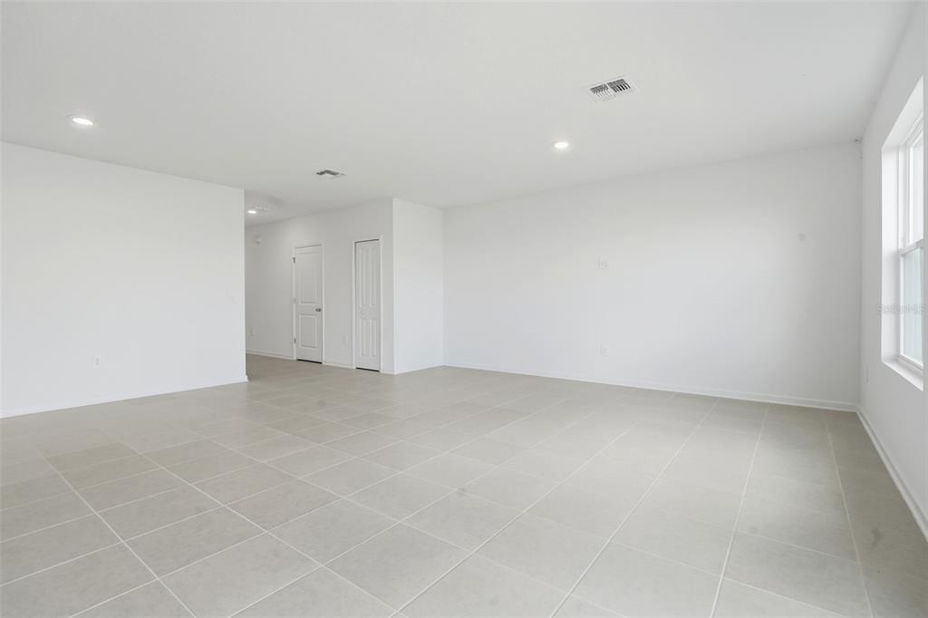 2756 Lookout Rdg Road Haines City, FL 33844 - Photo 16 of 53 an empty room with a natural light