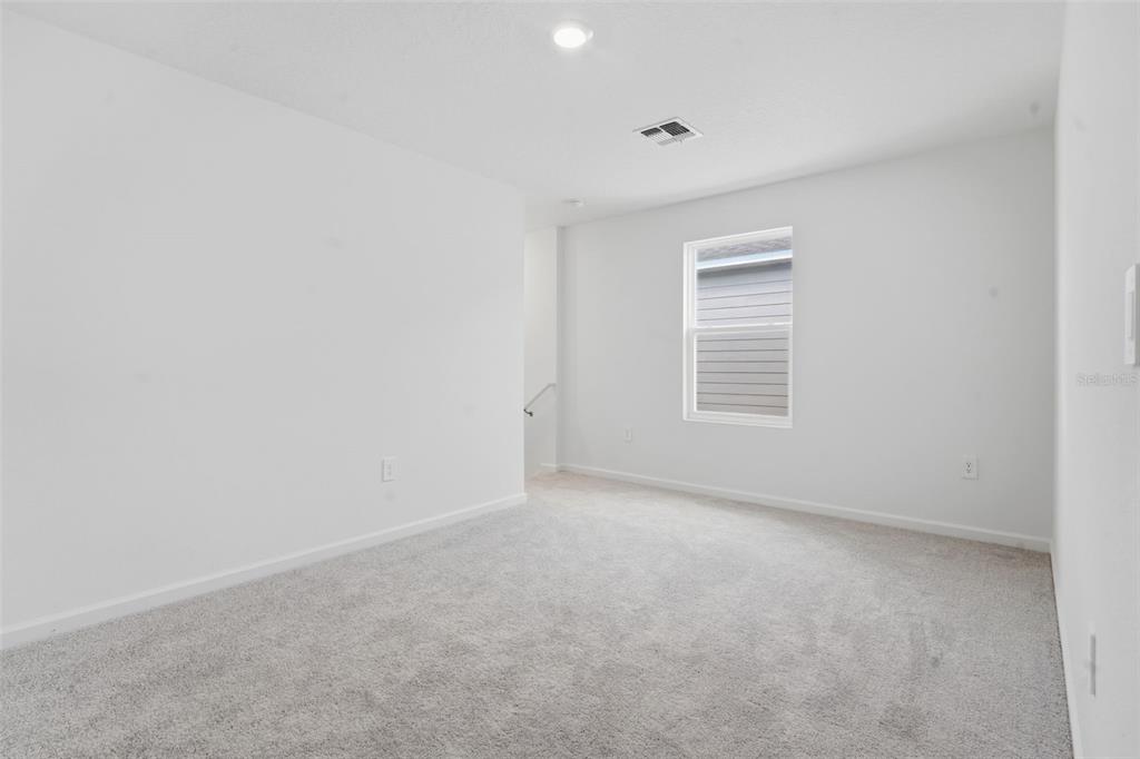 2756 Lookout Rdg Road Haines City, FL 33844 - Photo 24 of 53 an empty room with windows