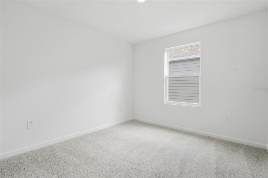 2756 Lookout Rdg Road Haines City, FL 33844 - Photo 31 of 53 an empty room with a window