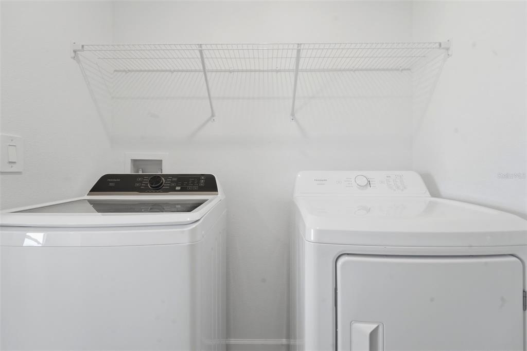 2756 Lookout Rdg Road Haines City, FL 33844 - Photo 53 of 53 a utility room with dryer and washer