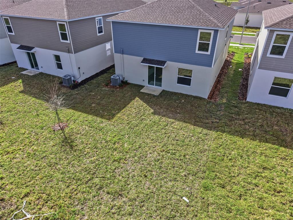 2756 Lookout Rdg Road Haines City, FL 33844 - Photo 8 of 53 a view of a house with a yard