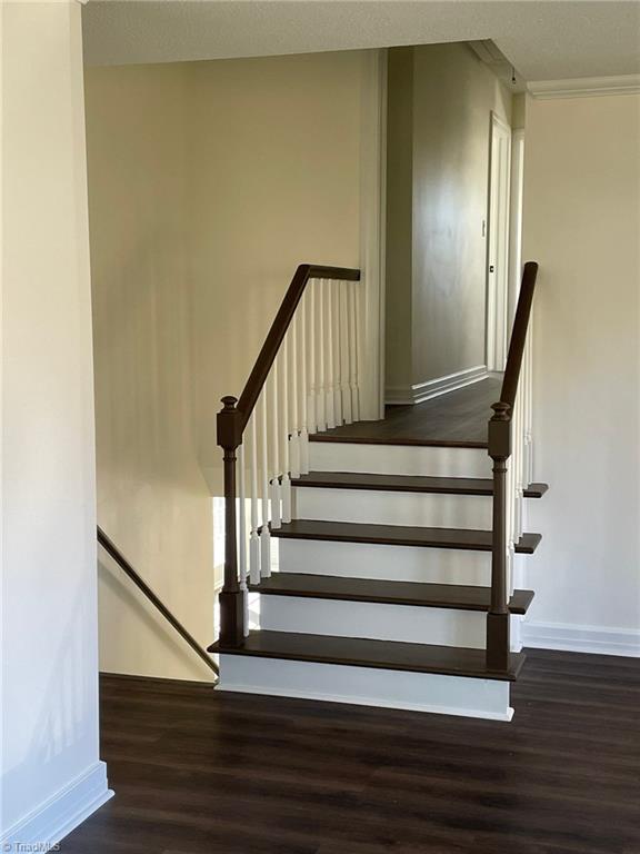 998 Nottingham Road High Point, NC 27262 - Photo 11 of 37 stairs to upper level bedrooms