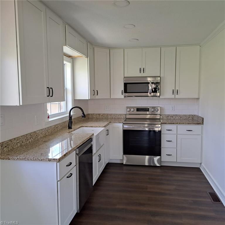 998 Nottingham Road High Point, NC 27262 - Photo 9 of 37 spacious kitchen with brand new appliances