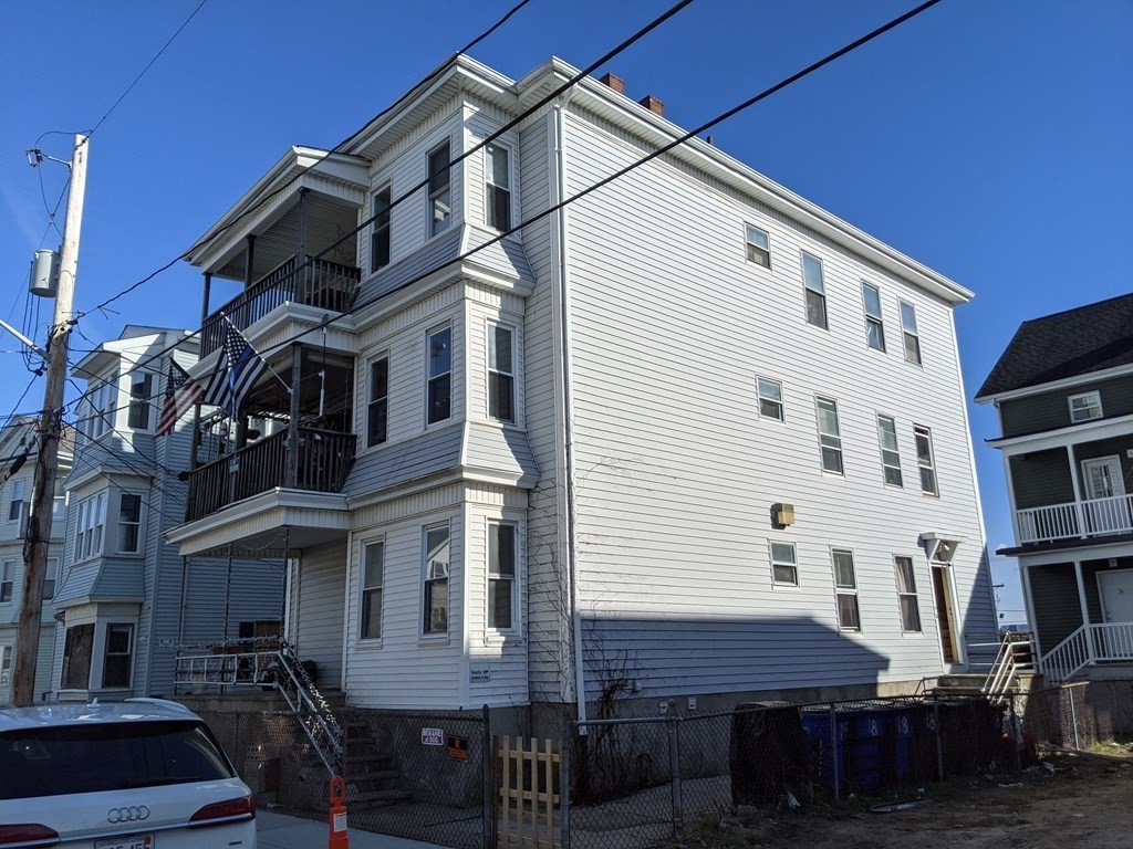 18 John Street Fall River, MA 02721 - Photo 1 of 10 a view of a white building with many windows